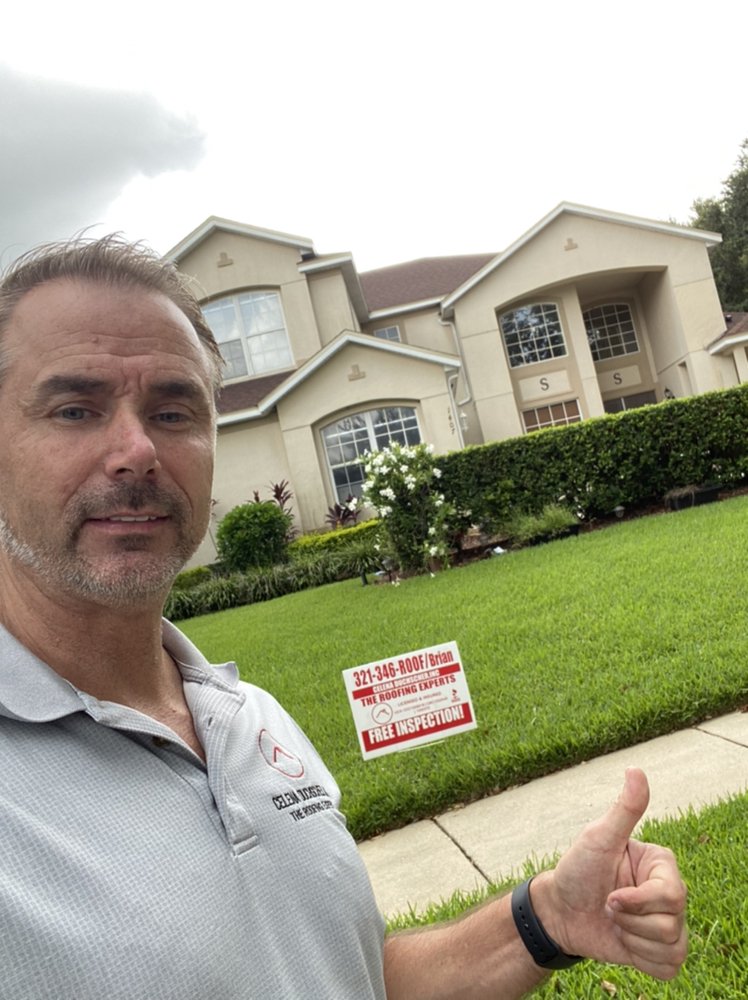 Slide of The Roofing Experts