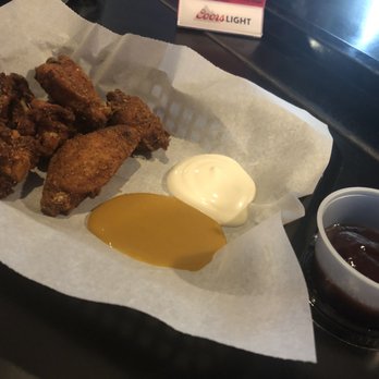 Pleasant Springs Pub - Chicken wings with the pub rub, ranch, honey mustard, and BBQ sauce. - Pubs Near Me - Stoughton, Wisconsin