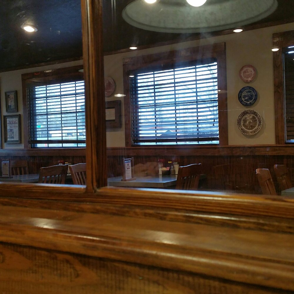 Elijah's Cafe - A glass paned division makes this room suitable for large parties. - Cafes Near Me - Jasper, Texas