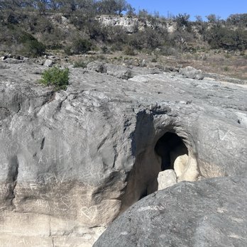 Pedernales Falls State Park - Eddy hole from when waters are higher, the churn carves out" caves " in the stone - Parks Near Me - Johnson City, Texas