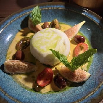 San Babila - BURRATA imported burrata, cherry tomato, figs, olives, mint & basil - Italian Near Me - New York, New York San Babila - BURRATA imported burrata, cherry tomato, figs, olives, mint & basil - Italian Near Me - New York, New York