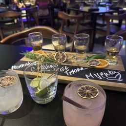 Happy hour margarita and Paloma and repasado tequila flight