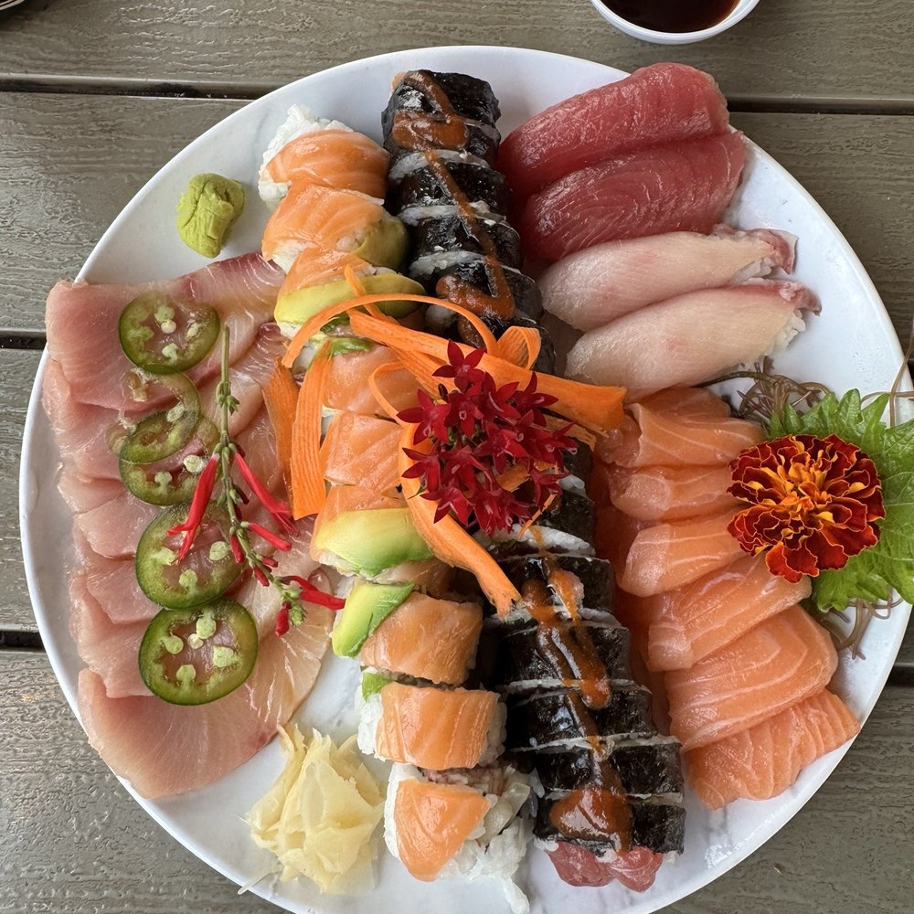 Kauai Sushi Station - Left to right: Yellowtail Jalapeño, Kapaa Sunrise Roll, King Ocean Roll, Maguro, Hamachi, Sake - Japanese Near Me - Lihue, Hawaii Kauai Sushi Station - Left to right: Yellowtail Jalapeño, Kapaa Sunrise Roll, King Ocean Roll, Maguro, Hamachi, Sake - Japanese Near Me - Lihue, Hawaii