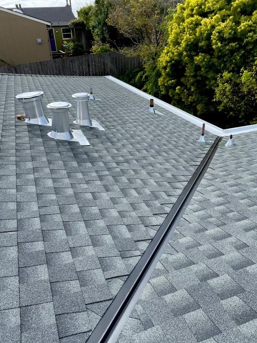 Slide of Mel's Roofing