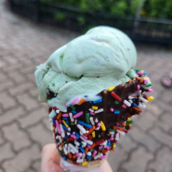 Cap’s Ice Cream - Mint chocolate chip ice cream on a rainbow sprinkle waffle cone - Ice Cream & Frozen Yogurt Near Me - Mount Prospect, Illinois
