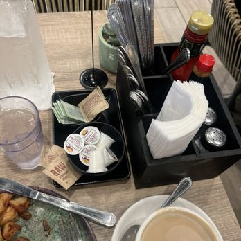 Aloha Stacks - I like they had an organized caddy for napkins and sauces, utensils, spices and coffee accoutrements. - Pancakes Near Me - El Monte, California