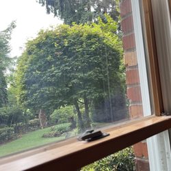 Happy House Works - Hard to see in photo, but window haze at bottom and track is still dirty. Pretty consistent throughout the house.