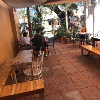 The Mansion - There's an outdoor area in the back with more seating - New American Near Me - Melbourne, Florida