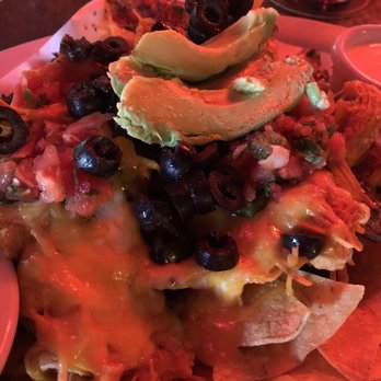 El Chupacabra - Loaded nachos - Bars Near Me - Seattle, Washington El Chupacabra - Loaded nachos - Bars Near Me - Seattle, Washington