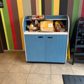 McDonald's - a colorful striped wall behind a blue cabinet - Fast Food Near Me - Long Beach, California McDonald's - a colorful striped wall behind a blue cabinet - Fast Food Near Me - Long Beach, California