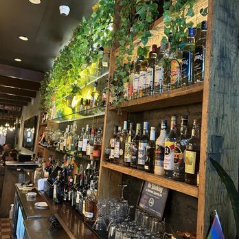 Rice X Beans - a bar with many bottles of alcohol - Brazilian Near Me - New York, New York Rice X Beans - a bar with many bottles of alcohol - Brazilian Near Me - New York, New York