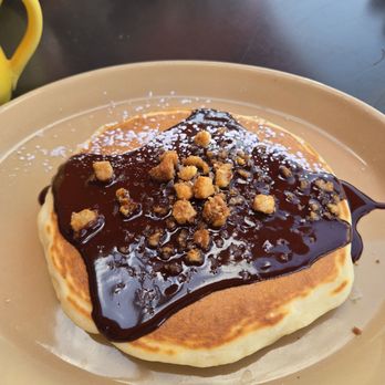 Snooze, an A.M. Eatery - Pancake of the day with chocolate panache and yummy crumbs. - Breakfast & Brunch Near Me - Orange, California Snooze, an A.M. Eatery - Pancake of the day with chocolate panache and yummy crumbs. - Breakfast & Brunch Near Me - Orange, California