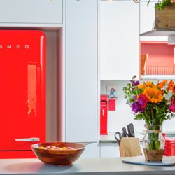 German Kitchen Center - Red & White Galley Kitchen by Leicht