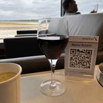 Admiral's Club - a glass of wine and a qr code - Airport Lounges Near Me Admiral's Club - a glass of wine and a qr code - Airport Lounges Near Me