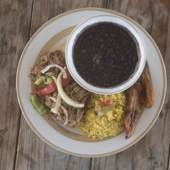 Iskas Secrets - Ropa Vieja with cuban yellow rice, black beans and Maduros - Food Trucks Near Me - Austin, Texas