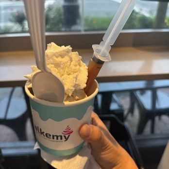 Alkemy - Cold brew creation with caramel syringe 9/10 (there's a little bit of the bubble waffle in it) - Ice Cream & Frozen Yogurt Near Me - Huntington, New York Alkemy - Cold brew creation with caramel syringe 9/10 (there's a little bit of the bubble waffle in it) - Ice Cream & Frozen Yogurt Near Me - Huntington, New York