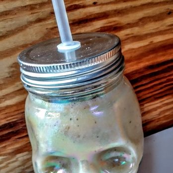 Smash Mode - a glass jar with a straw in it - Food Trucks Near Me Smash Mode - a glass jar with a straw in it - Food Trucks Near Me