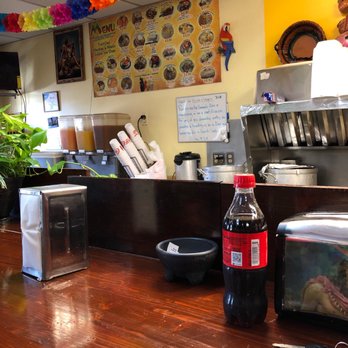 Laplacita Grill - a table with a bottle of soda - Mexican Near Me - Rocky Mount, North Carolina Laplacita Grill - a table with a bottle of soda - Mexican Near Me - Rocky Mount, North Carolina