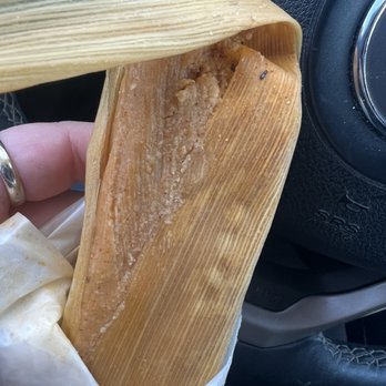 Tamale Kitchen - You can see the bug in the top left corner and it's antennas on the wrapper - Mexican Near Me - Northglenn, Colorado