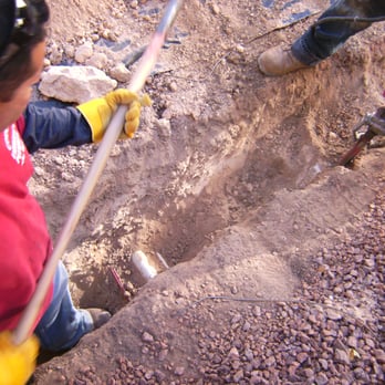 Code Red Emergency Plumbing - Working on digging a trench for a water line replacement. - Plumbing Near Me - Las Vegas, Nevada Code Red Emergency Plumbing - Working on digging a trench for a water line replacement. - Plumbing Near Me - Las Vegas, Nevada