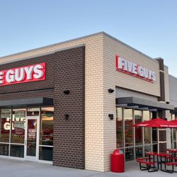 An exterior photograph of the Five Guys restaurant at 6160 Silverstone Drive in Frederick, Colorado.