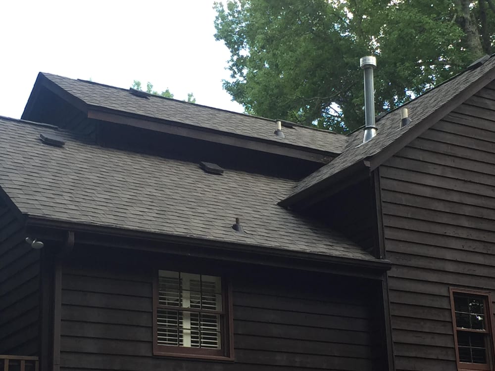 Slide of Chris Roofing