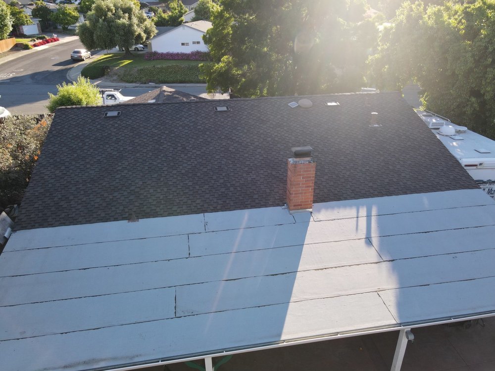 Slide of East Bay Roofing