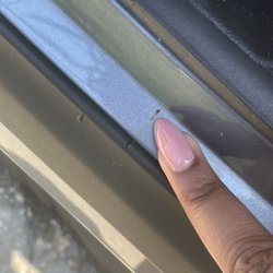 Autopark Car Wash - This is bird poop, not rust. Used my nails to scratch it up.