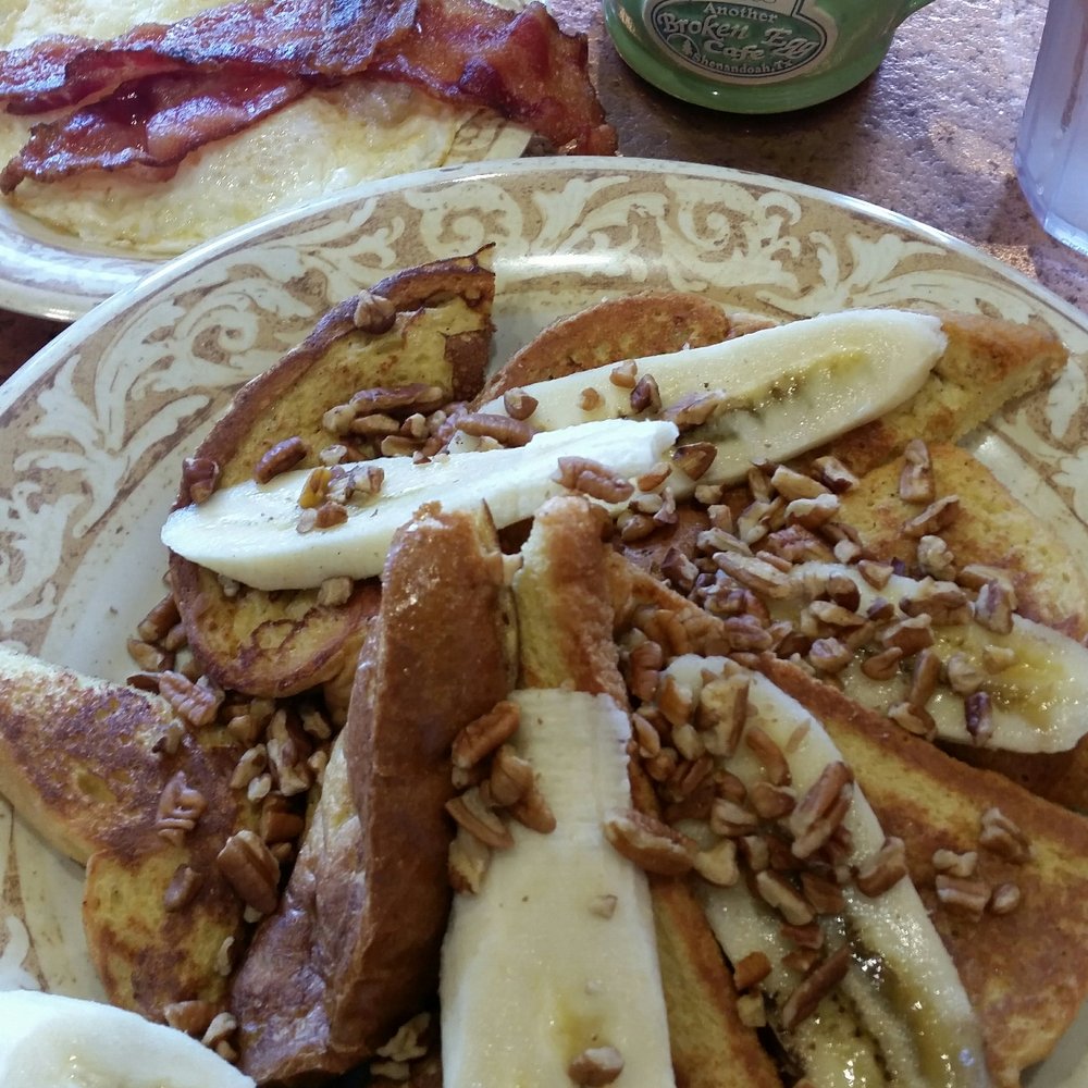 Another Broken Egg Cafe - Hawaiian Bread French Toast with fresh bananas and pecans. - Breakfast & Brunch Near Me - Shenandoah, Texas