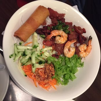 Saigon Cafe - bun Tom Thit Nuong Cha Gio - Vermicelli noodle bowl with shrimp, pork, carrots cucumber lettuce peanuts. - Vietnamese Near Me - Buford, Georgia Saigon Cafe - bun Tom Thit Nuong Cha Gio - Vermicelli noodle bowl with shrimp, pork, carrots cucumber lettuce peanuts. - Vietnamese Near Me - Buford, Georgia