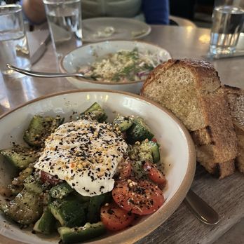 Manuela - Burrata, Persian Cucumber, Cherry Tomatoes, Smoked Trout Roe, Urfa Vinaigrette, Polenta Toast - New American Near Me - Los Angeles, California Manuela - Burrata, Persian Cucumber, Cherry Tomatoes, Smoked Trout Roe, Urfa Vinaigrette, Polenta Toast - New American Near Me - Los Angeles, California
