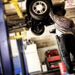1st Class Towing & Auto Services - Our mechanic are always hard at work.