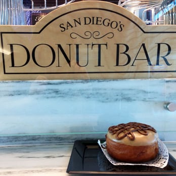 Elegant Desserts - Donut Bar sign and my "Oh My Peanut Butter OREO" donut ... one of the featured seasonal flavors. - Desserts Near Me - San Diego, California Elegant Desserts - Donut Bar sign and my "Oh My Peanut Butter OREO" donut ... one of the featured seasonal flavors. - Desserts Near Me - San Diego, California