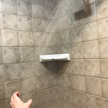 Ascot Suites - Our vertically placed "rainfall" shower head, which resulted in a 3 inch area of water. Didn't matter, never any hot water anyways. - Hotels Near Me - Morro Bay, California Ascot Suites - Our vertically placed "rainfall" shower head, which resulted in a 3 inch area of water. Didn't matter, never any hot water anyways. - Hotels Near Me - Morro Bay, California