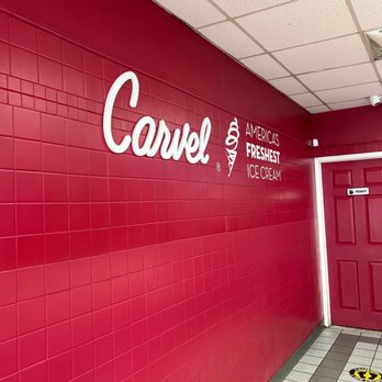 Carvel - a red wall with white lettering - Ice Cream & Frozen Yogurt Near Me - Stewart Manor, New York Carvel - a red wall with white lettering - Ice Cream & Frozen Yogurt Near Me - Stewart Manor, New York