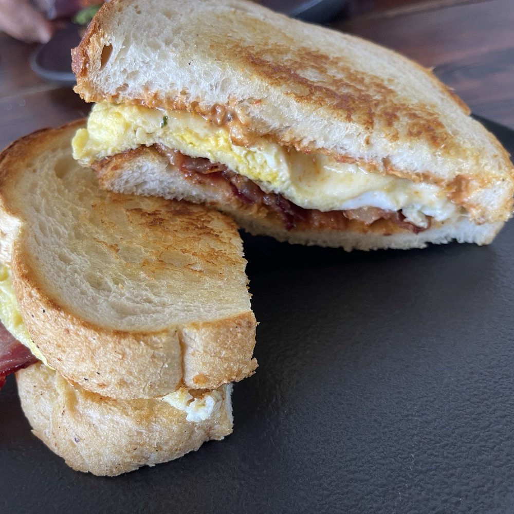 Steel Cup Café - Another angle of my delicious bacon eggs sandwich - Sandwiches Near Me - Long Beach, California Steel Cup Café - Another angle of my delicious bacon eggs sandwich - Sandwiches Near Me - Long Beach, California