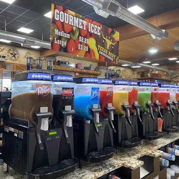 Texas  Best Smokehouse - Many flavors of ICEE. Unfortunately the Dr. Pepper one tasted flat. - Barbeque Near Me - Italy, Texas