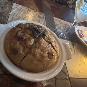 Hermon's - A beautiful round bread DROWNED in garlic and butter - New American Near Me - Los Angeles, California