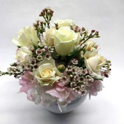 Greenfield Flower Shop - A sweet arrangement of white roses, pink hydrangea, and wax flower