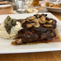 Stokehouse Grill - Ribeye medium rare, mashed potatoes, asparagus and mushrooms