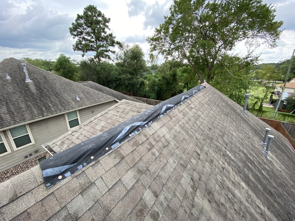 Slide of SNT Roofing And Construction