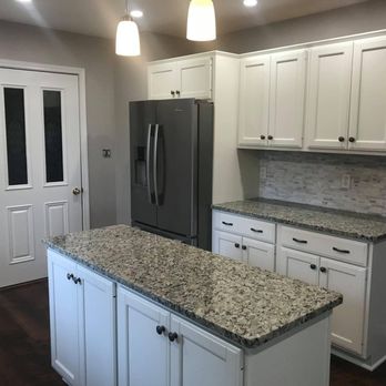 NST Services - a kitchen with granite counter tops - General Contractors Near Me NST Services - a kitchen with granite counter tops - General Contractors Near Me