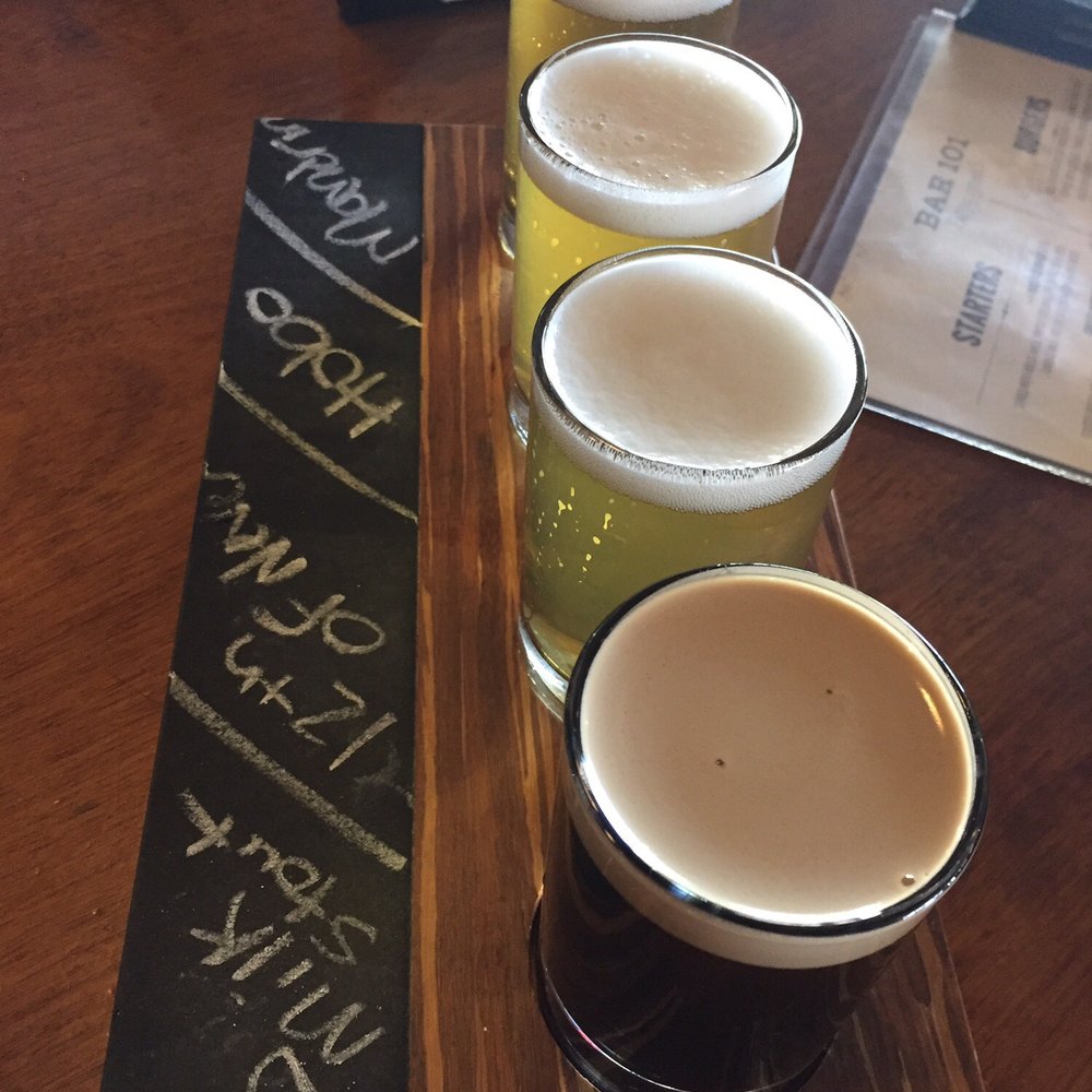Bar 101 Eats & Drinks - Flight of beers! Try a few - so many to pick from! - Sports Bars Near Me - Roseville, California