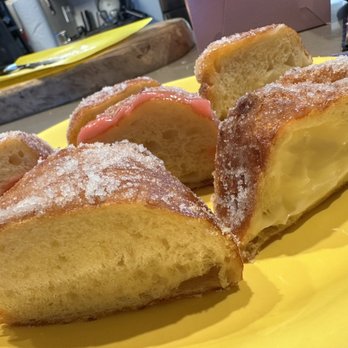 Leonard's Bakery - Cut in half - Bakeries Near Me - Honolulu, Hawaii Leonard's Bakery - Cut in half - Bakeries Near Me - Honolulu, Hawaii