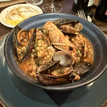 Nevodi - This amazing sort of a regional ciopinno with pearl couscous, really amazing dish, very flavorful - Bars Near Me - Venezia, VE