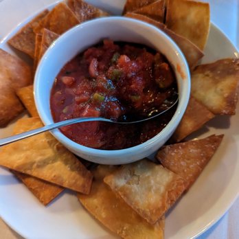 Fiorano - Homemade chips as a complimentary appetizer - Mediterranean Near Me - Barboursville, Virginia Fiorano - Homemade chips as a complimentary appetizer - Mediterranean Near Me - Barboursville, Virginia