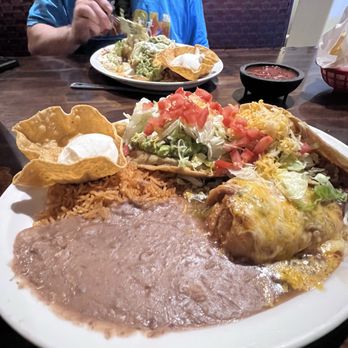Los Dos Potrillos - The #18 with a guacamole tostada, chile relleno, beef taco, rice and beans. - Mexican Near Me - Parker, Colorado Los Dos Potrillos - The #18 with a guacamole tostada, chile relleno, beef taco, rice and beans. - Mexican Near Me - Parker, Colorado