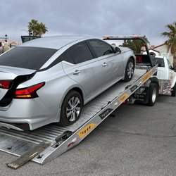Asap Towing - I mistakenly popped the trunk while the tow driver pulled my car up the bed