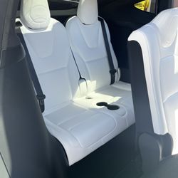 Automotive Soft Trim - Third row seats original seat covers--before installation.