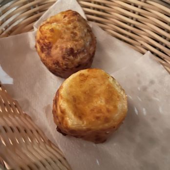 Rainhas Churrascaria - Cheese cassava rolls at the table. I ate 3 before snapping pic - Brazilian Near Me - Corona, New York